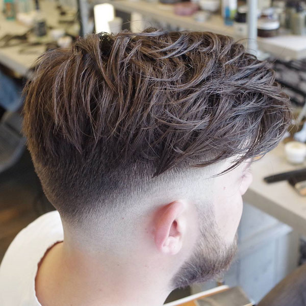 Low Fade + Messy Longer Hair on Top