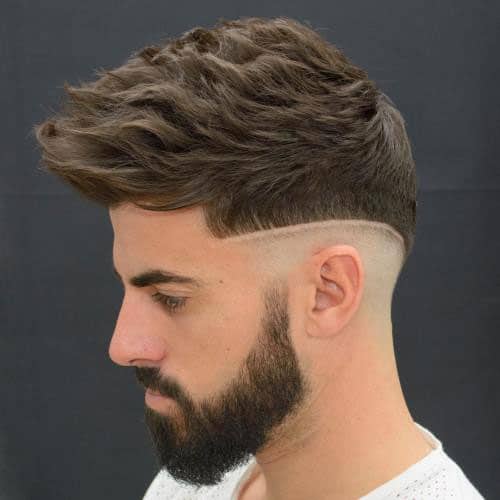 Wavy Hawk + Mid Shaved Sides + Full Beard" width="500" height="500" srcset="http://flashmag.tn/wp-content/uploads/2019/08/1567098993_119_35-meilleures-coupes-de-cheveux-de-Faux-Hawk-Fohawk-pour.jpg 500w, https://www.menshairstylestoday.com/wp-content/uploads/2017/04/Wavy-Hawk-Mid-Shaved-Sides-Full-Beard-150x150.jpg 150w, https://www.menshairstylestoday.com/wp-content/uploads/2017/04/Wavy-Hawk-Mid-Shaved-Sides-Full-Beard-300x300.jpg 300w, https://www.menshairstylestoday.com/wp-content/uploads/2017/04/Wavy-Hawk-Mid-Shaved-Sides-Full-Beard-100x100.jpg 100w" sizes="(max-width: 500px) 100vw, 500px" data-jpibfi-post-excerpt="" data-jpibfi-post-url="https://www.menshairstylestoday.com/faux-hawk-haircuts-for-men/" data-jpibfi-post-title="35 Faux Hawk (Fohawk) Haircuts For Men" data-jpibfi-src="http://flashmag.tn/wp-content/uploads/2019/08/1567098993_119_35-meilleures-coupes-de-cheveux-de-Faux-Hawk-Fohawk-pour.jpg