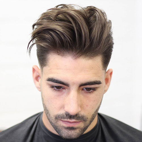 Coupe de cheveux de Quiff texturée longue + Fade Low