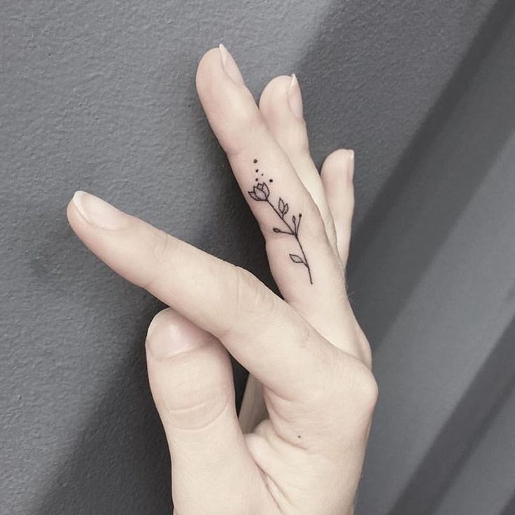 Gothic Flowers finger tattoo