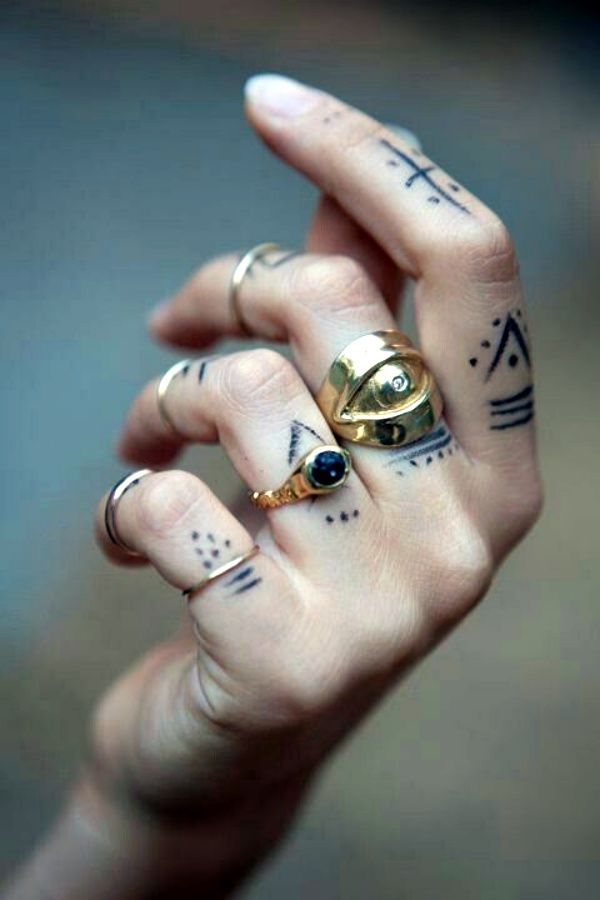 tribal finger tattoo