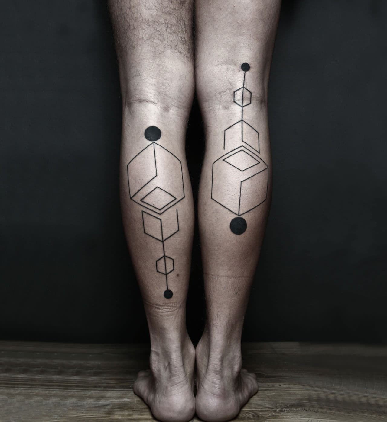 Geometric Designs Calf Tattoo