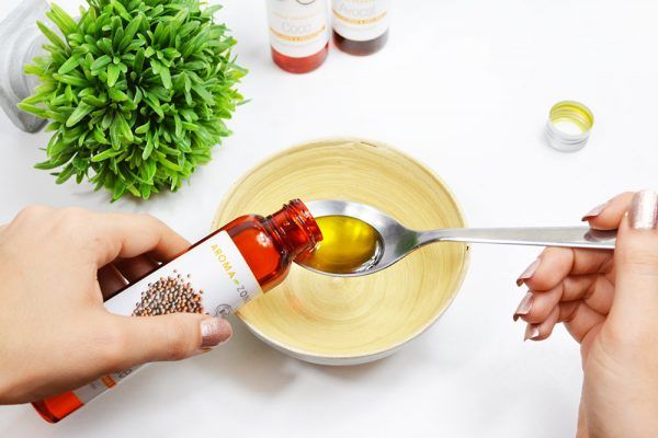 Comment faire un bain d'huile cheveux bouclés ?