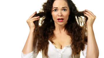 What causes frizzy hair after a shower?